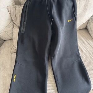 Nike Black Joggers with Yellow Accents